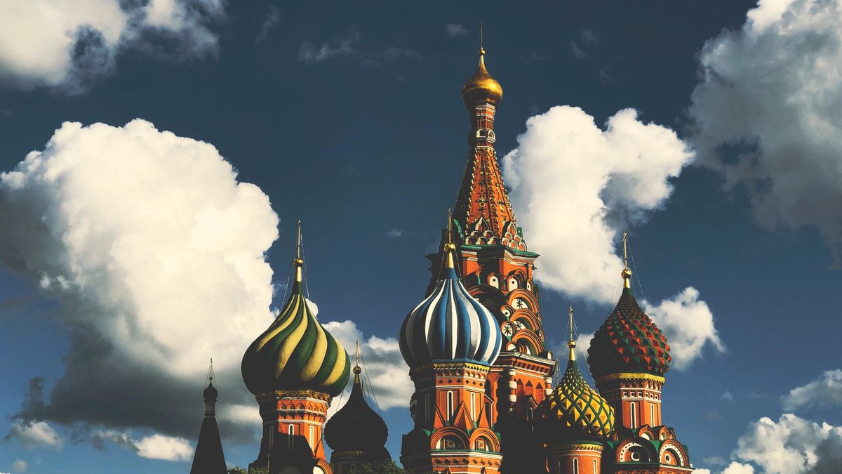 St Basil's Cathedral in Moscow, against a blue sky with white clouds.