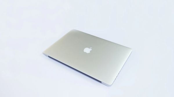 Closed Macbook on a white background.