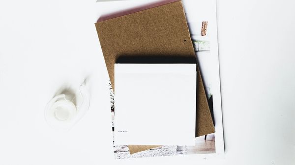 Various notepapers on a white background.