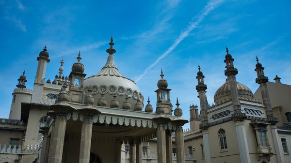 The Brighton Pavilion against a bright blue sky.