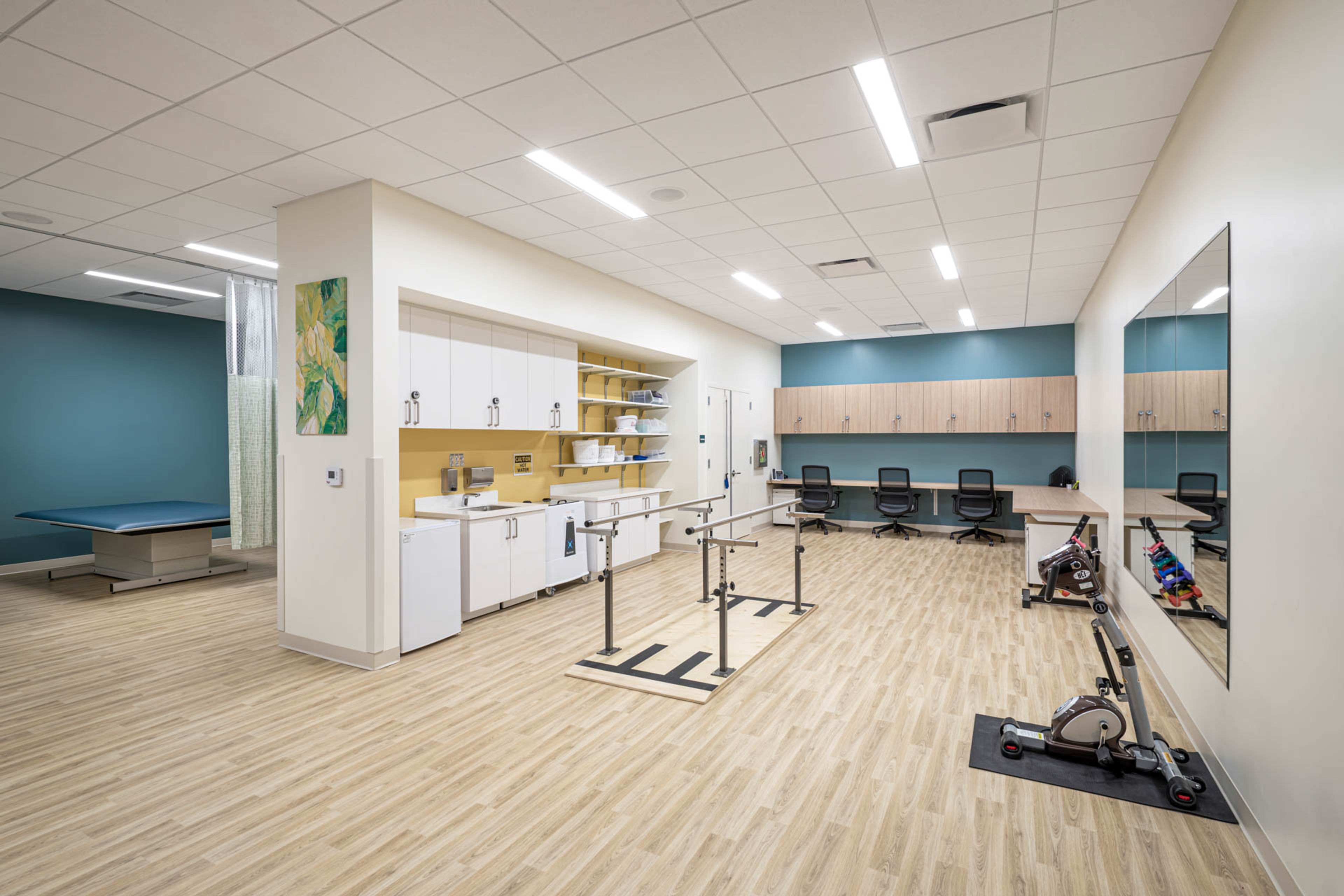 Gym and rehab space providing physical therapy and occupational therapy for seniors at Habitat Health PACE with Kaiser Permanente