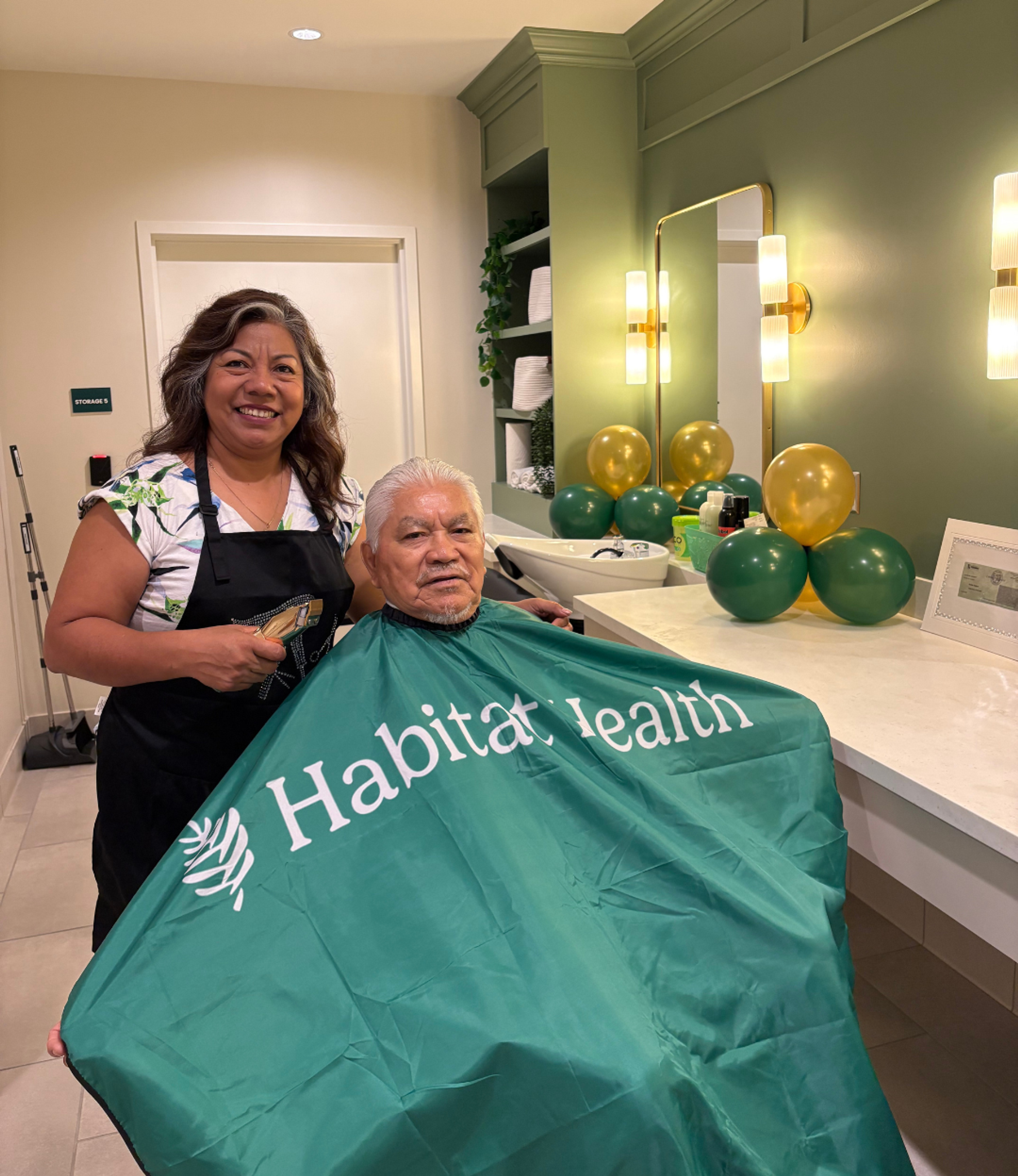 A South LA participant receives a fresh cut in our spa on opening day.