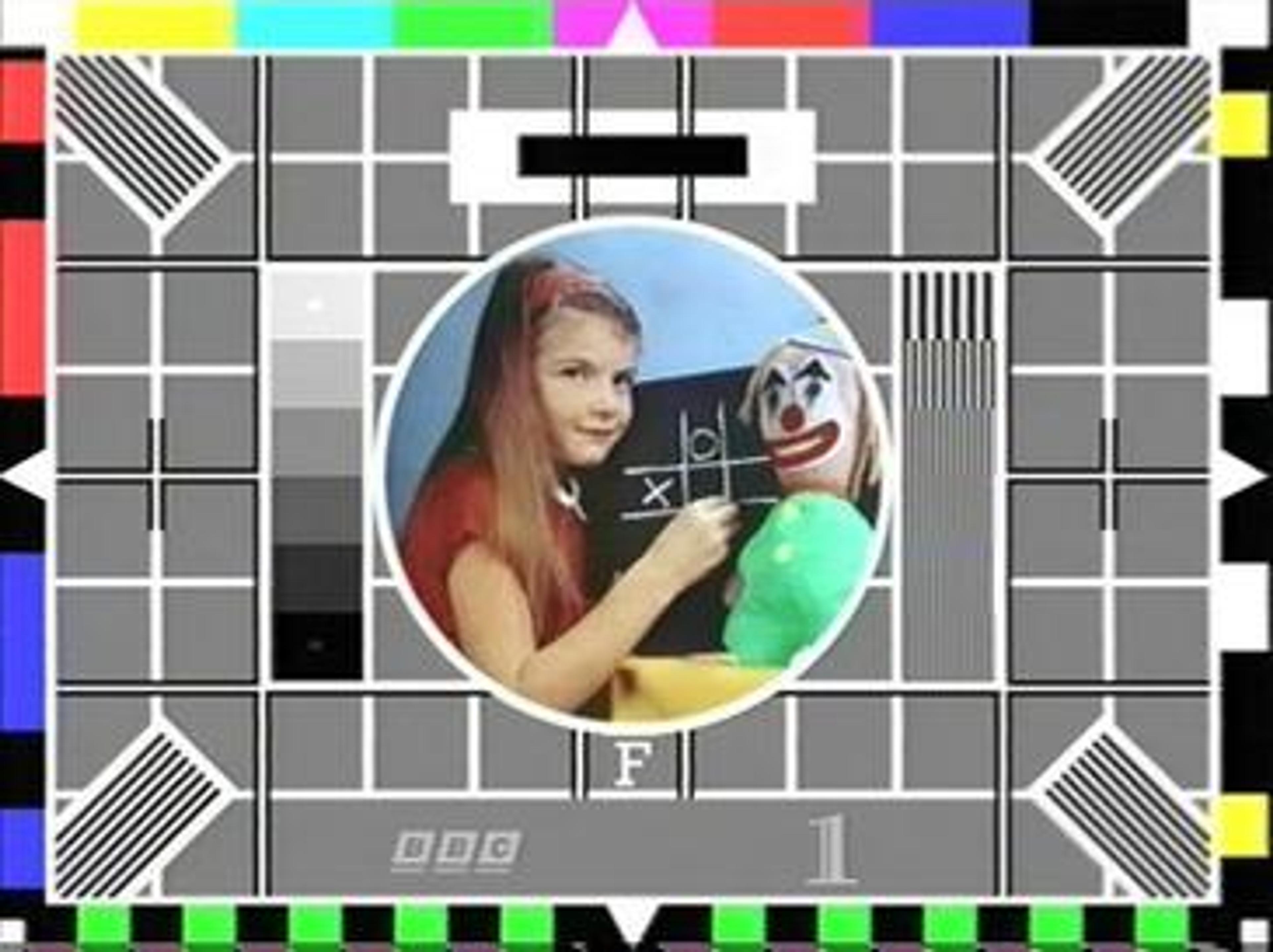 girl and puppet test card
