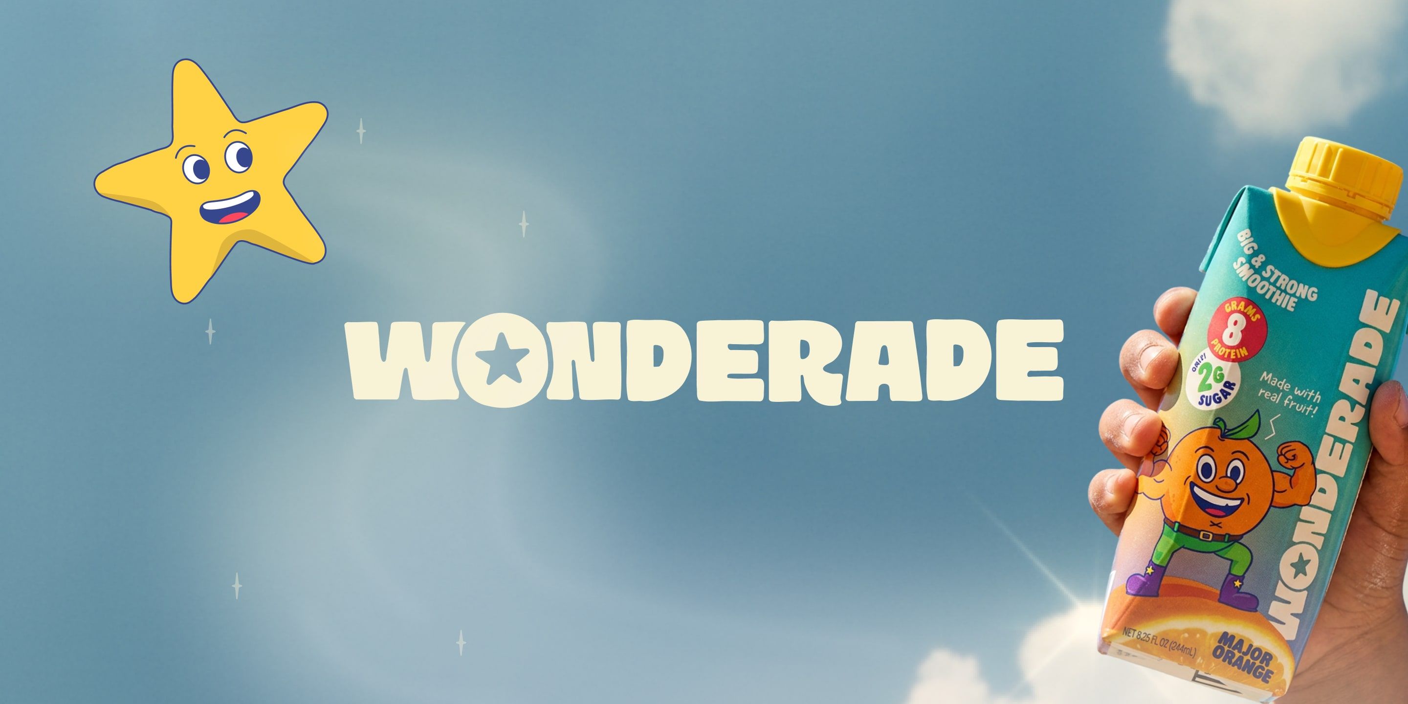 The Wonderade wordmark floating in a blue sky beside Pip, a smiling yellow star, as a hand holds up a Major Orange smoothie carton.