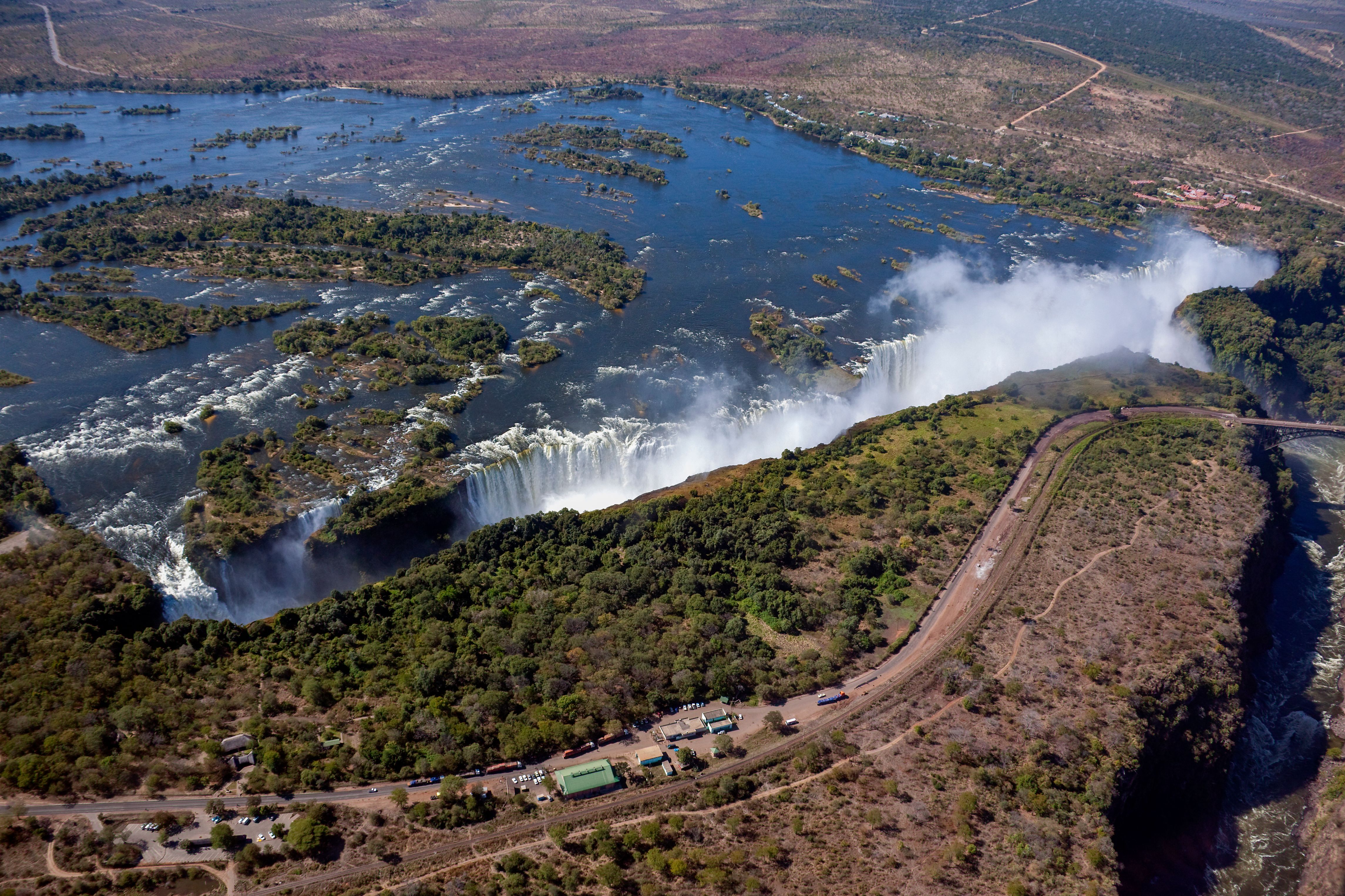 Victoria Falls - Devil's Pool - natural infinity pool at the edge of the falls · Smoke That Thunders viewpoint · White-water rafting in the Zambezi Gorge