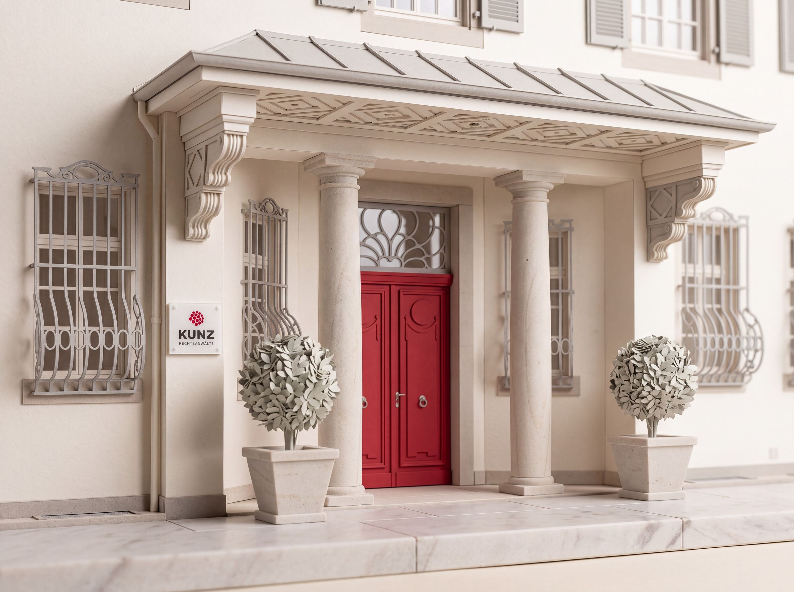Eingang der Villa mit roter Tür und KUNZ-Schild