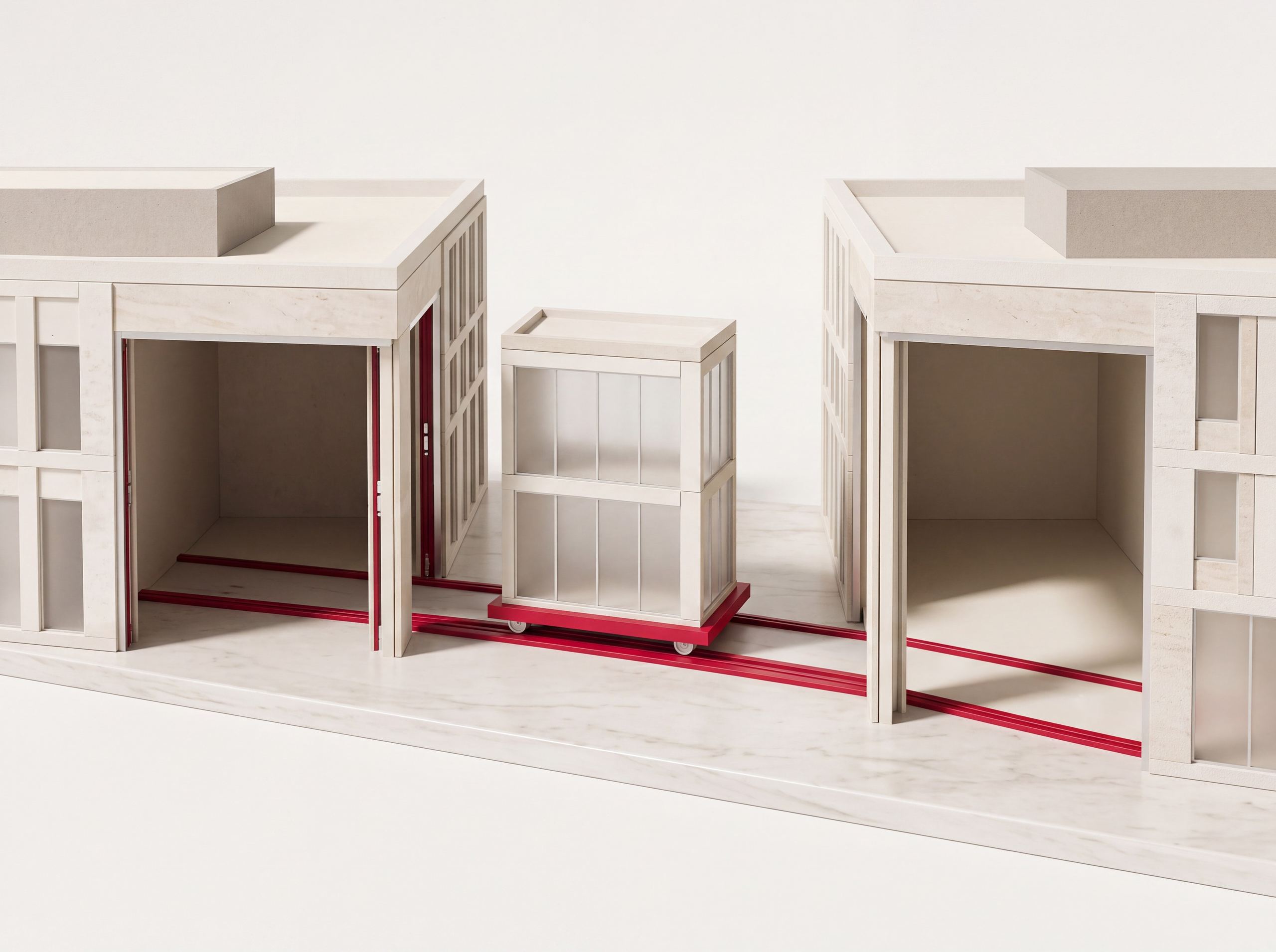 Zwei Architekturmodelle, ein Gebäudeflügel wird auf roter Plattform verschoben
