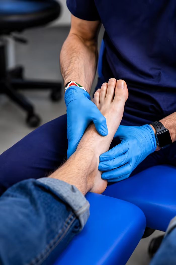Clinician assessing ankle pain and foot mechanics at Active Step in Fareham