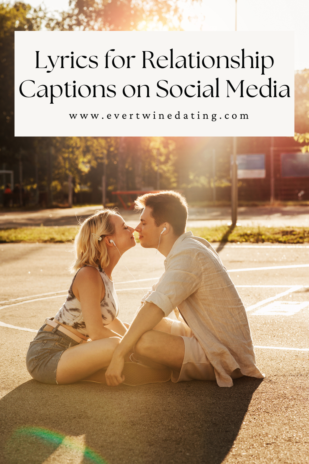 a boyfriend and girlfriend sit cross-legged on a park pavement, about to kiss while sharing headphones listening to muisc. The text over lay reads, "Lyrics for Relationship Captions on Social Media"