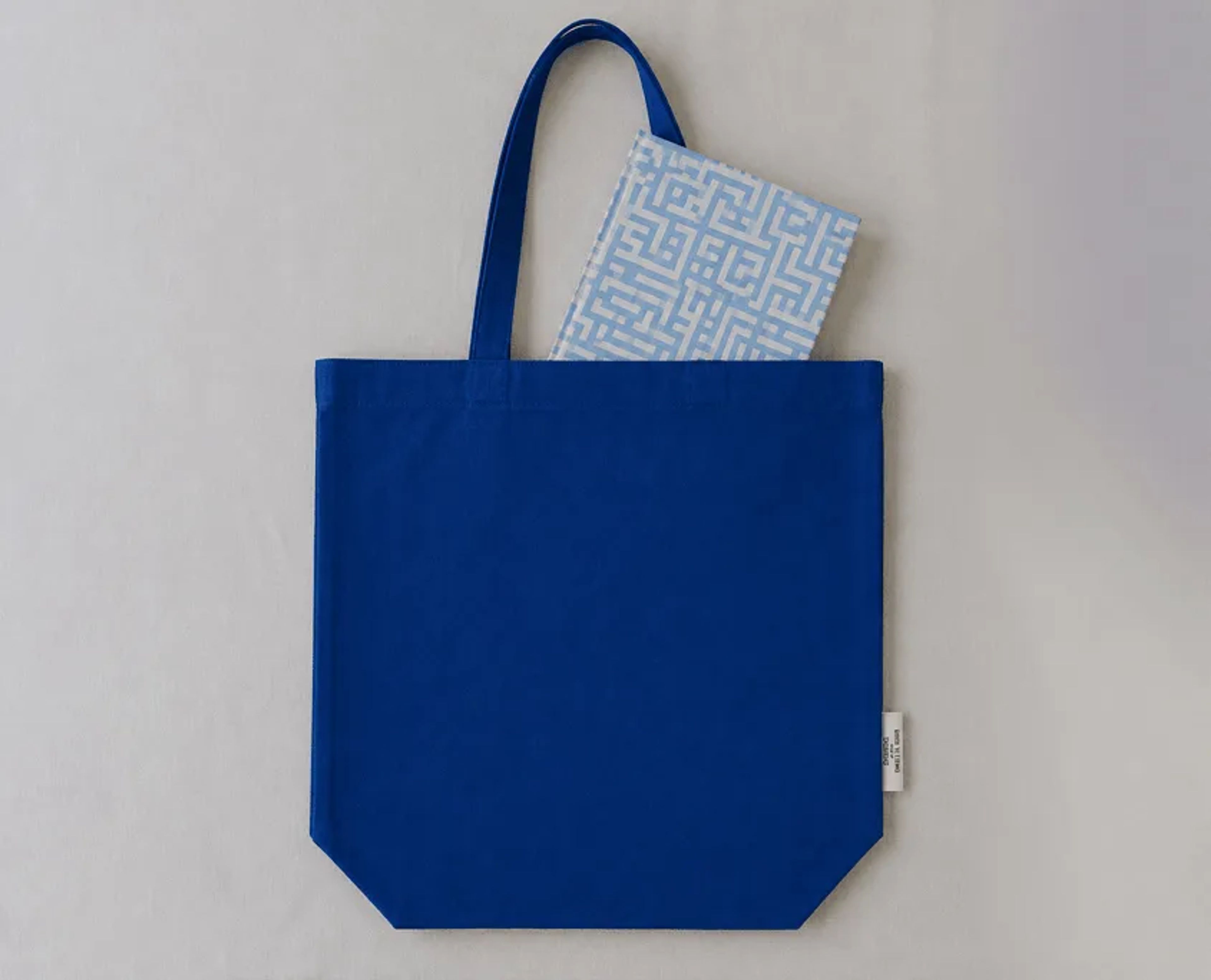 Tall tote in 100% ogranic cotton canvas in dyed to match blue