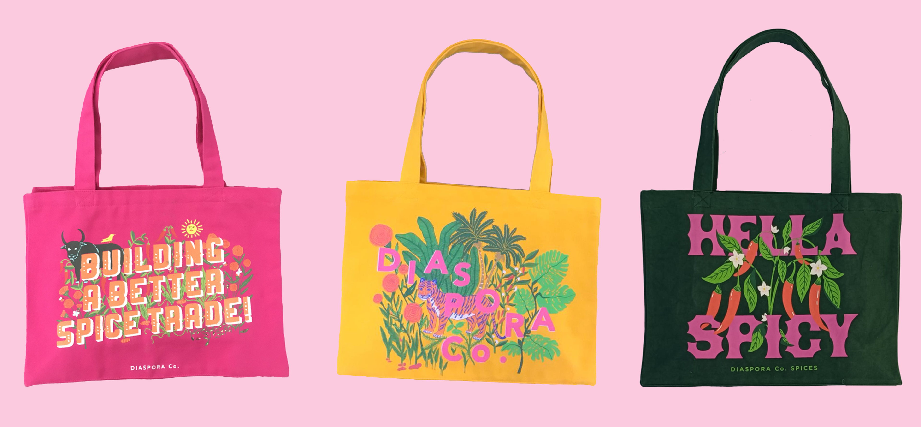 Three colorful Diaspora Co. Spices tote bags in pink, yellow, and green against pink background.