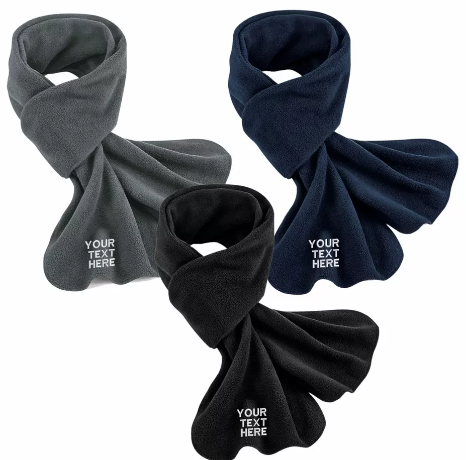 Three folded fleece scarves in gray, navy blue, and black with customizable text areas.