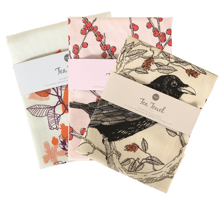 Stack of digitally printed tea towels