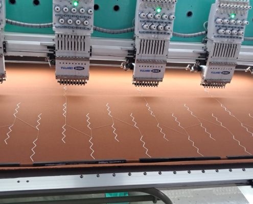 Embroidery machine running a pattern