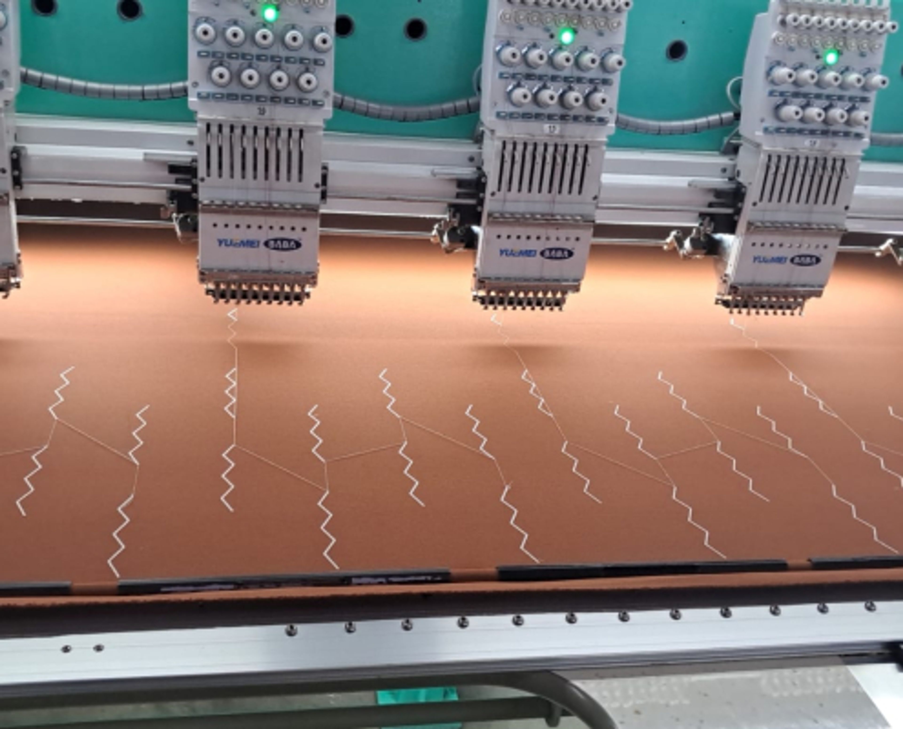 Embroidery machine running a pattern