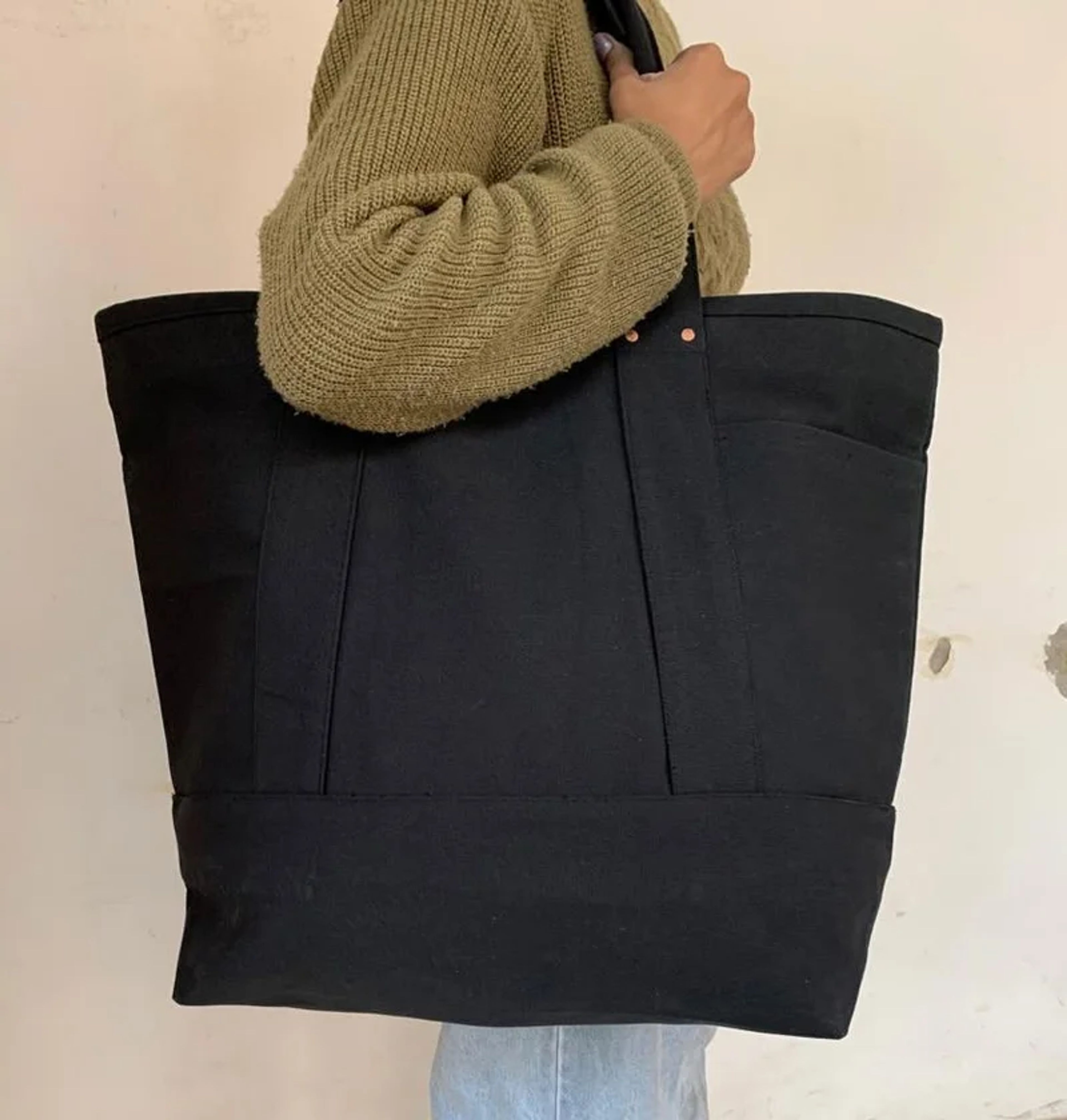 100 Year Bag in black cotton canvas and self fabric handles.