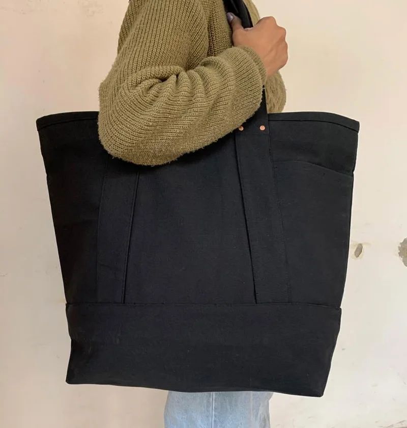 100 Year Bag in black cotton canvas and self fabric handles.