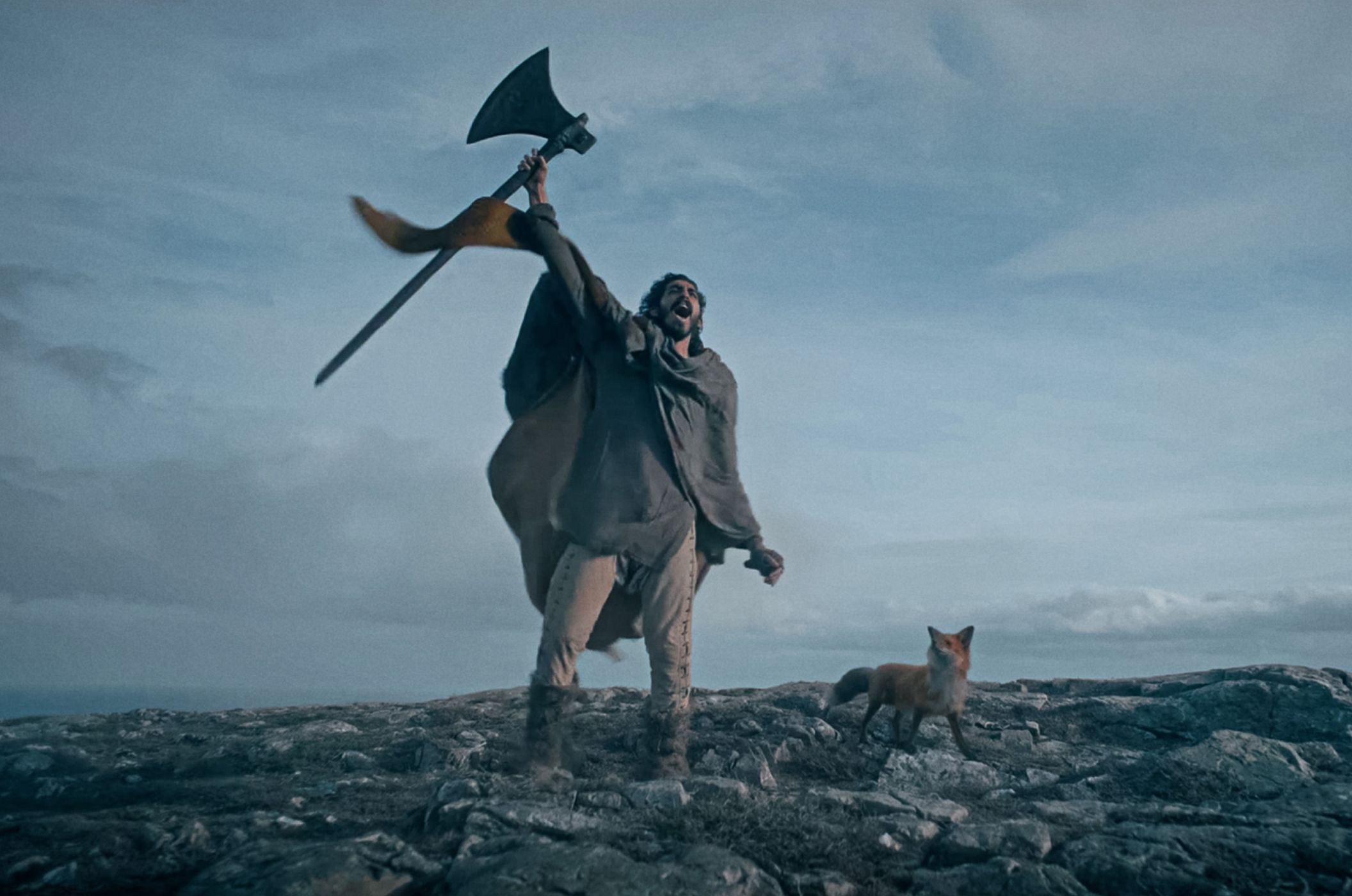 Movie character raising his battle axe.