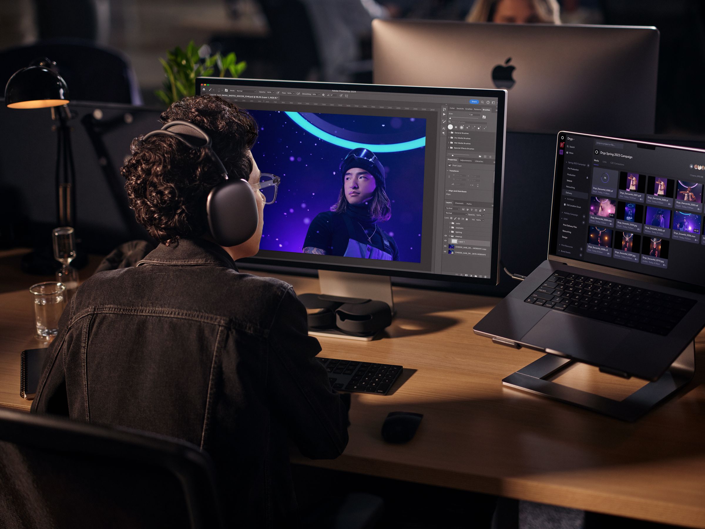 Man sitting at desk and using Share for Review in Photoshop.