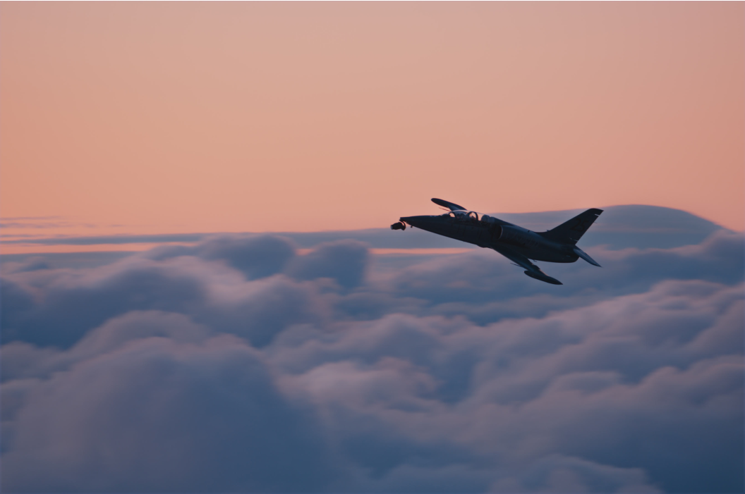 Airplane above the clouds.