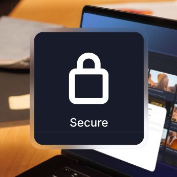 A dark blue icon with a white padlock and the word "Secure" overlaid on a blurred laptop screen.