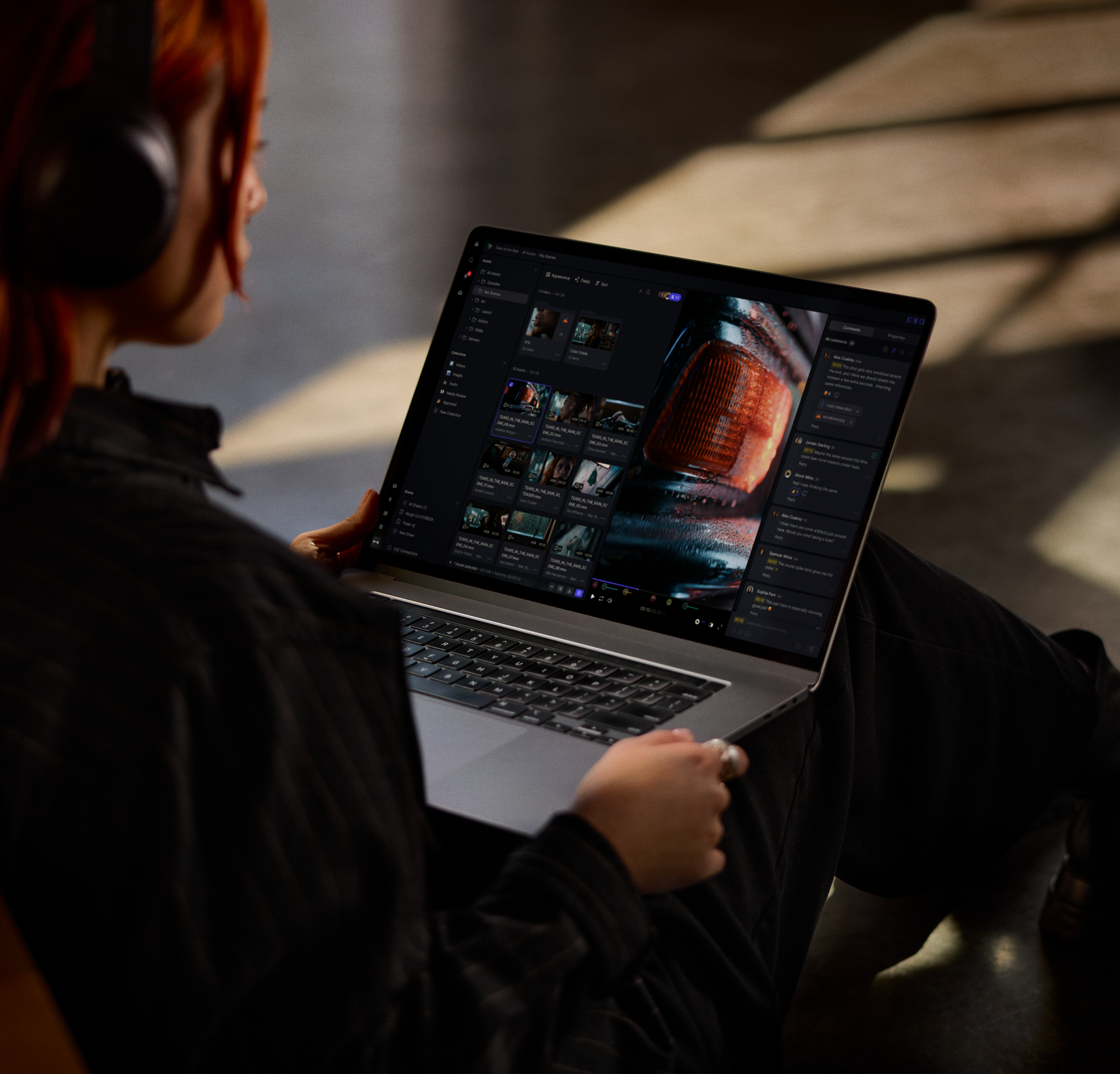 Woman holding laptop using Frame.io
