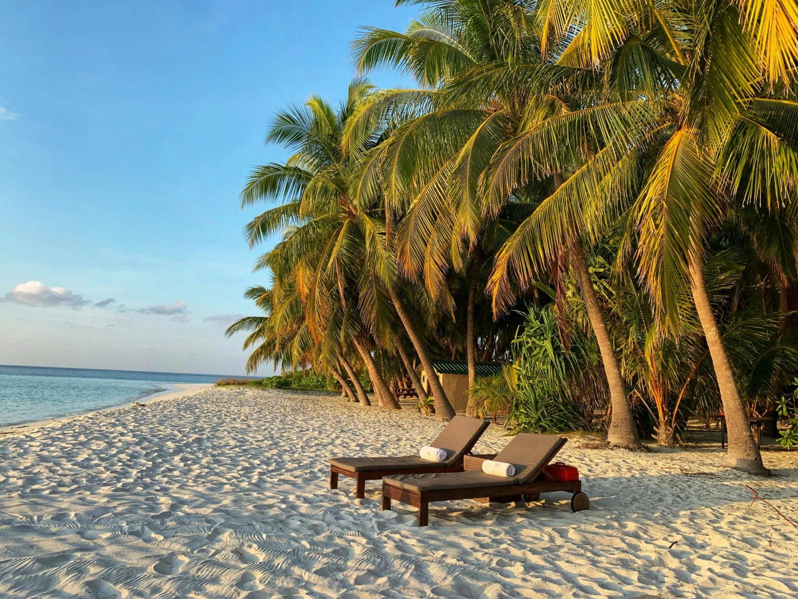 Day Pass at a Private Island Beach Resort & Orphanage Visit