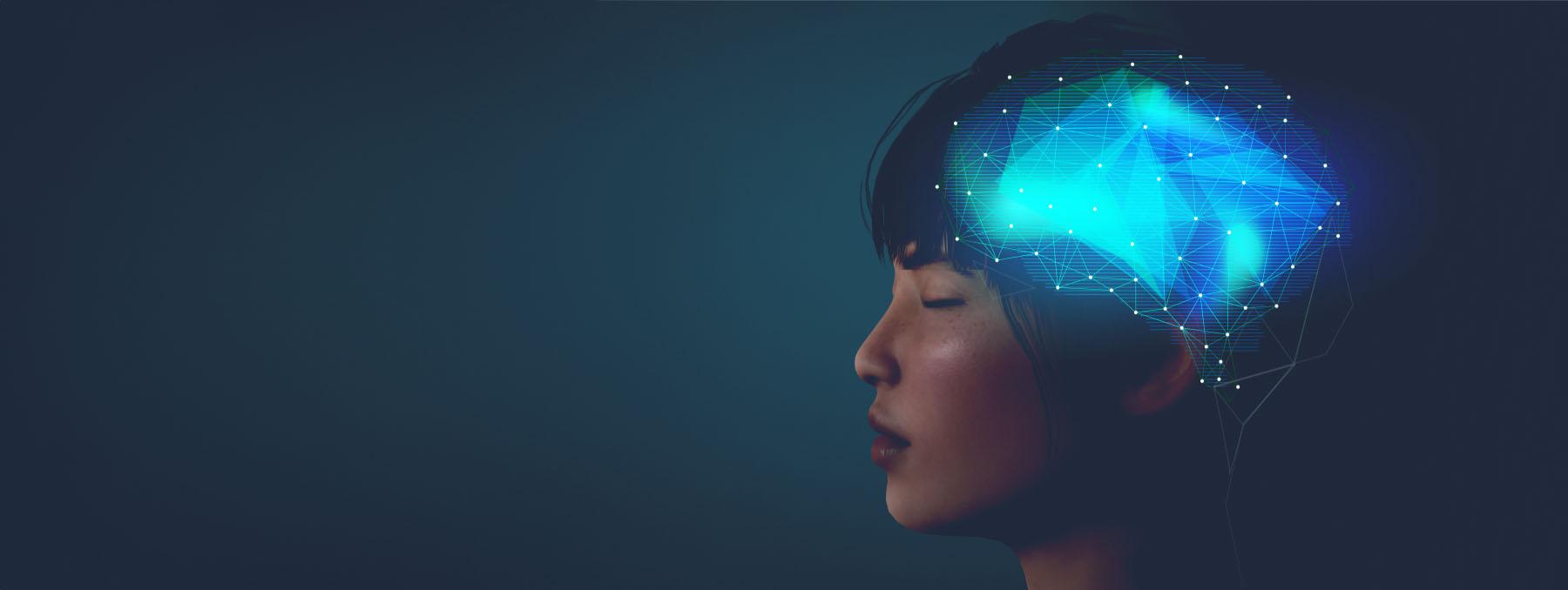 Person in profile with eyes closed, showing a glowing blue, geometric brain.