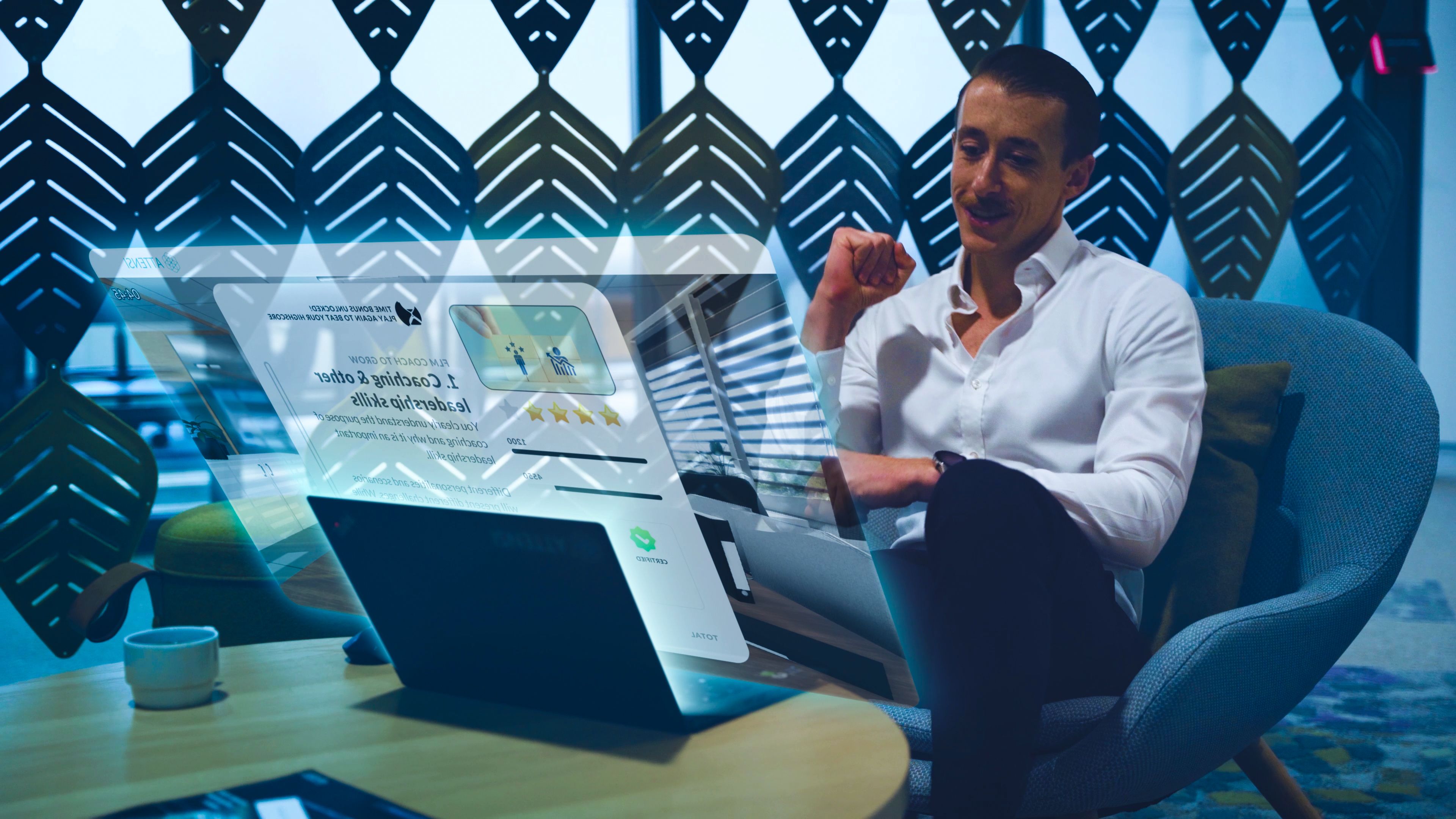 A man watches a glowing, transparent laptop display showing a review in a modern office.