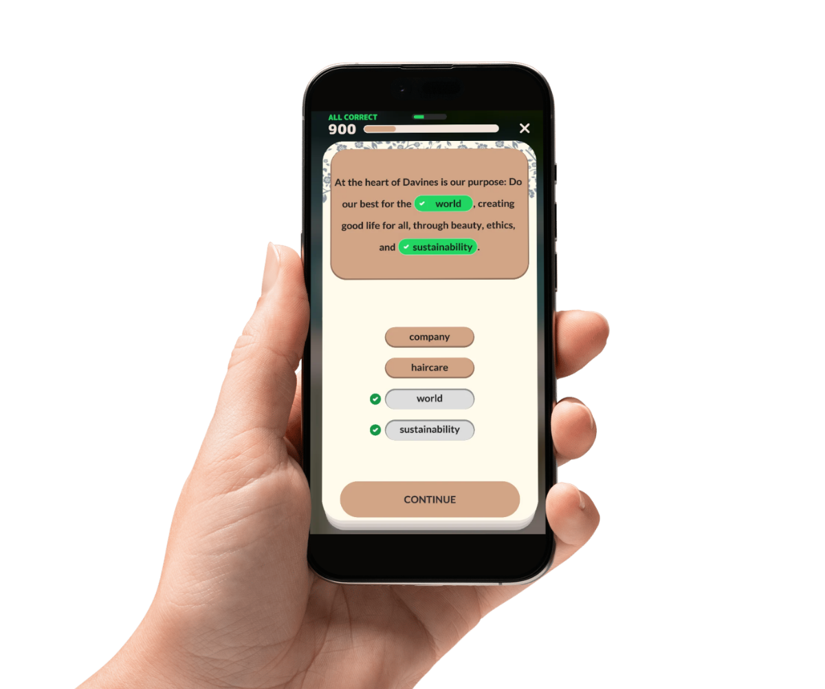 Hand holding a smartphone displaying an educational quiz with "world" and "sustainability" marked as correct answers.