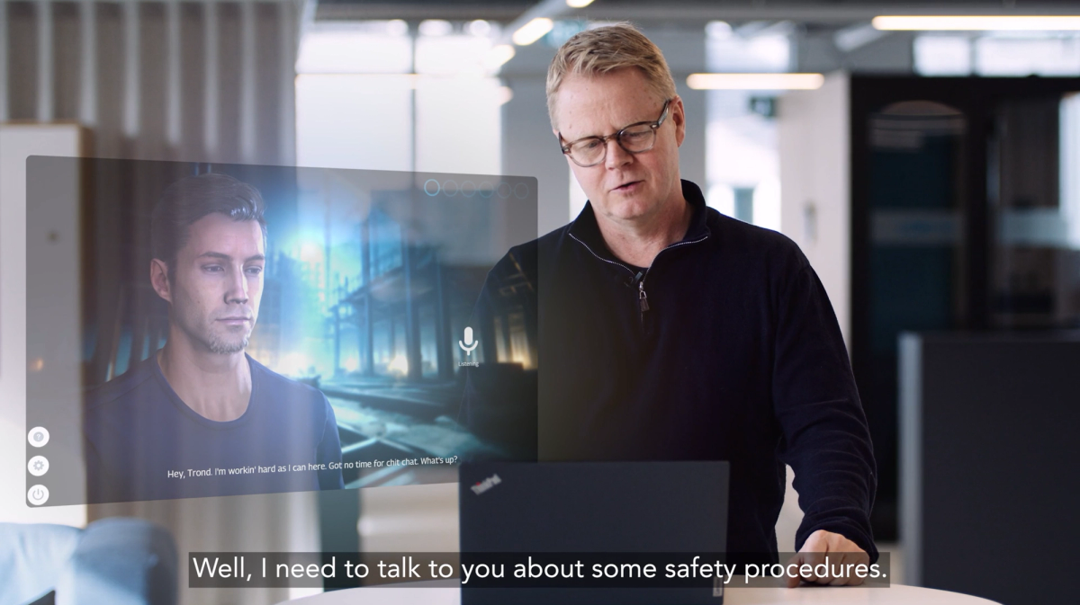 Man practising a safety conversation with an AI avatar on a floating screen
