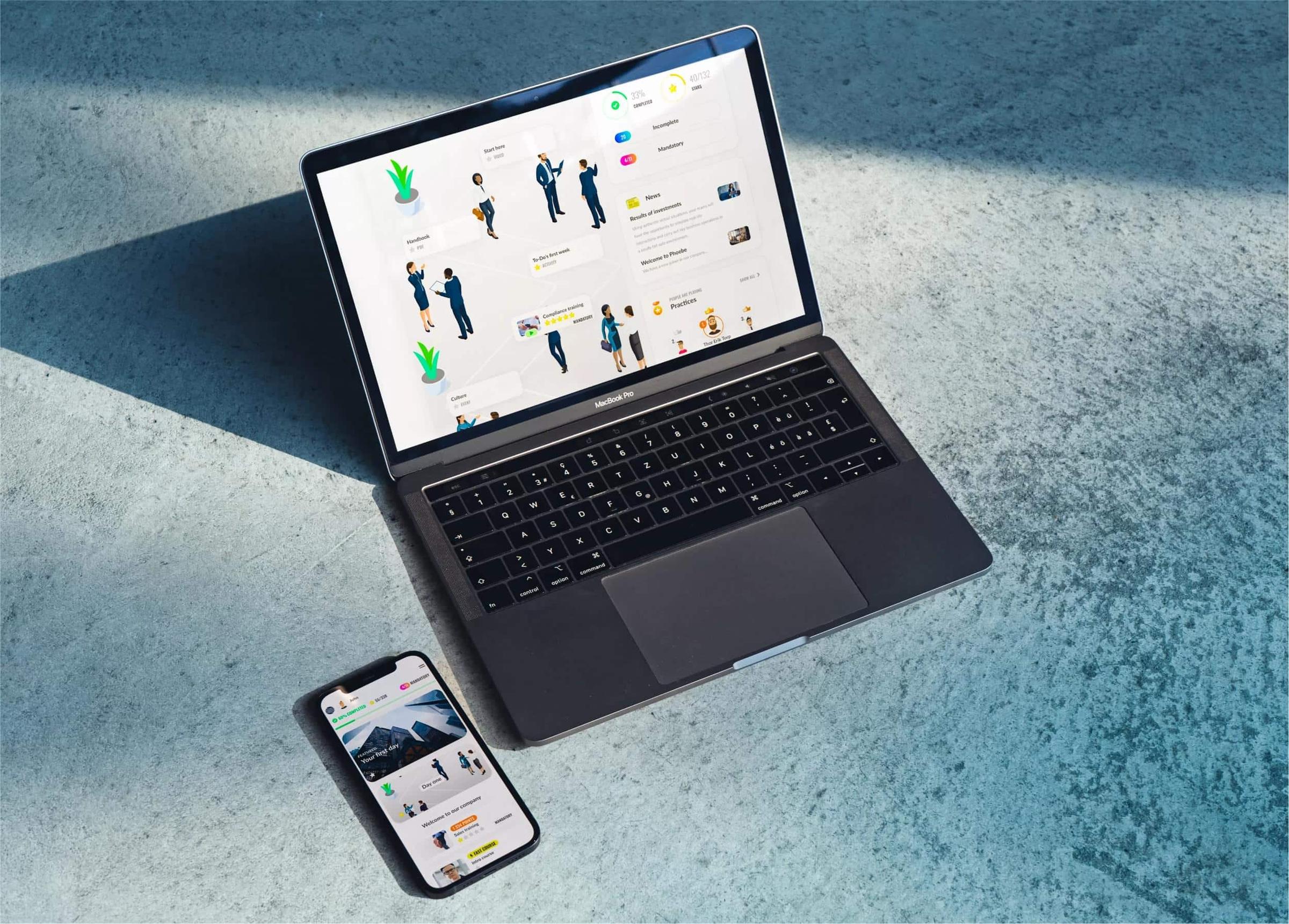 Attensi training shown on a laptop and a mobile phone