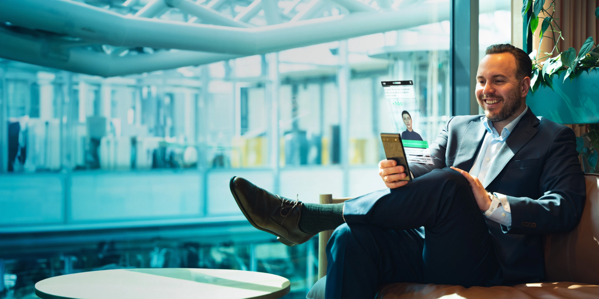 Man using Attensi Skills on a mobile phone, financial services