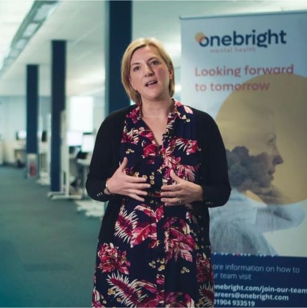 OneBright employee talking