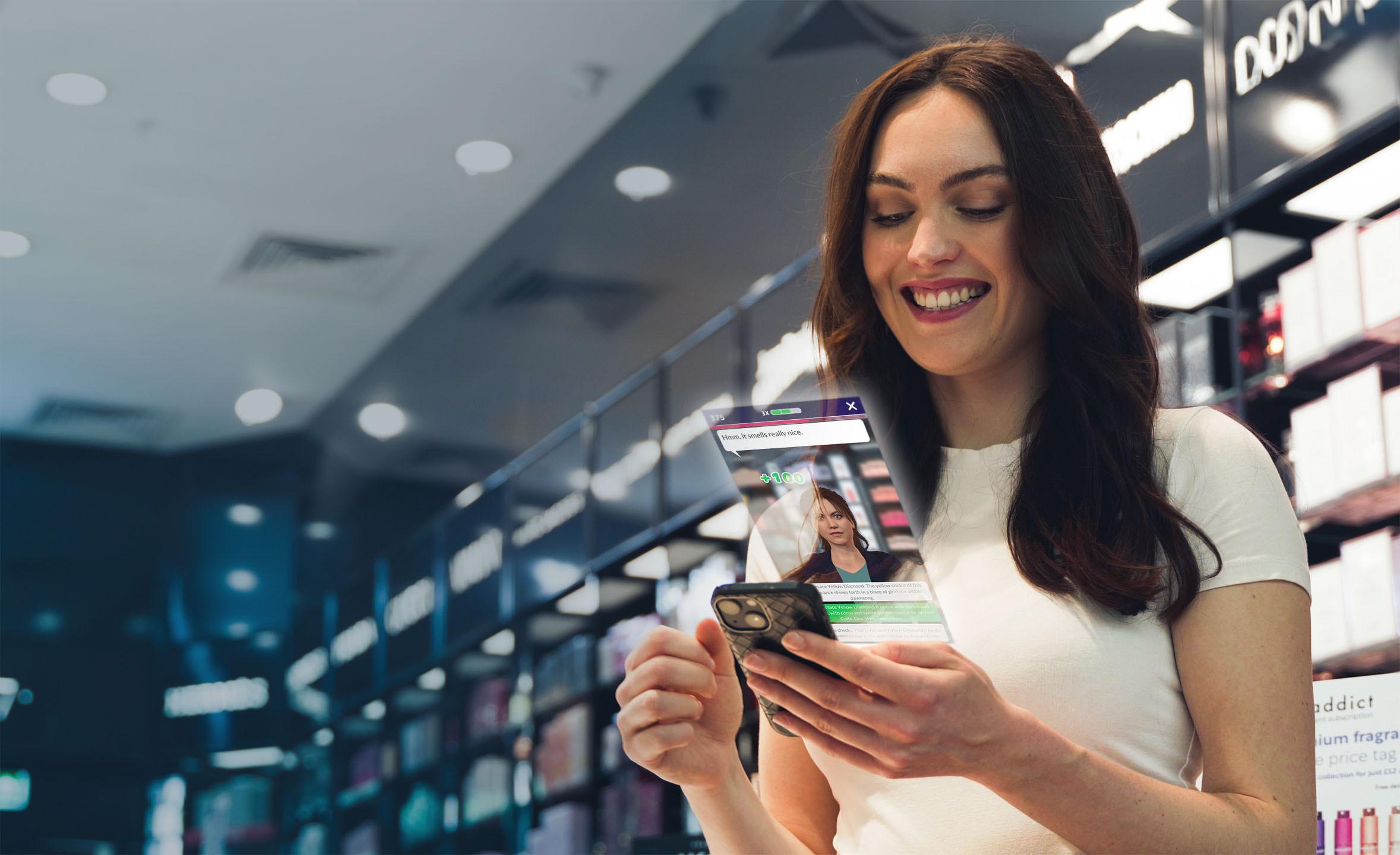 The Fragrance Shop employee training on her phone