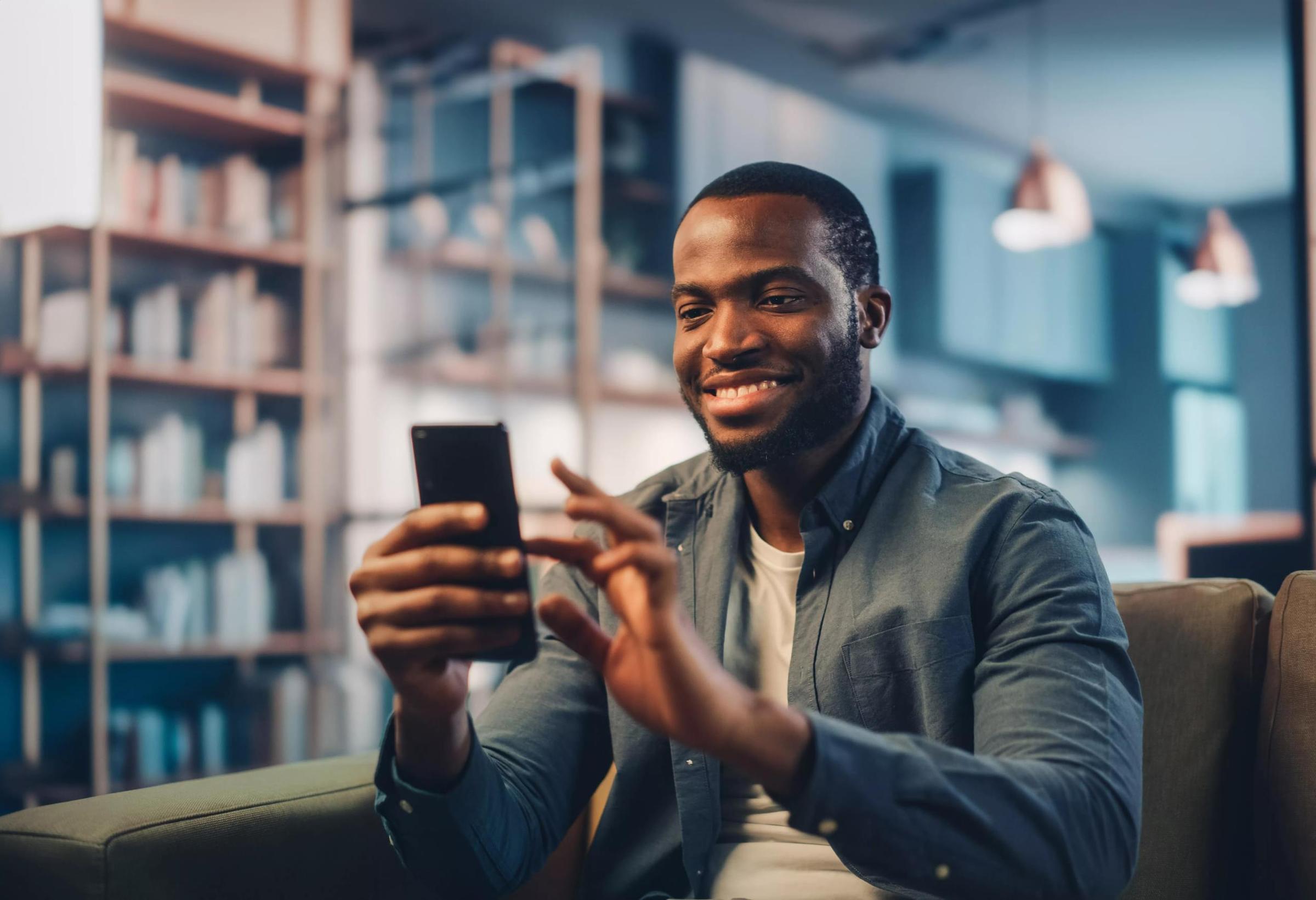 Man tapping a phone