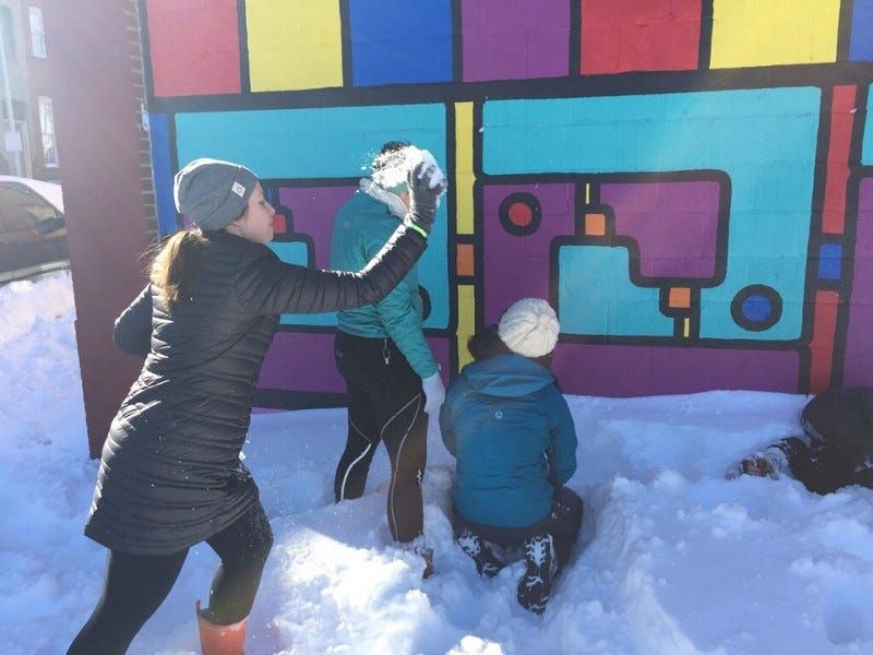 Baltimore City teachers celebrating their first snow day of the year.