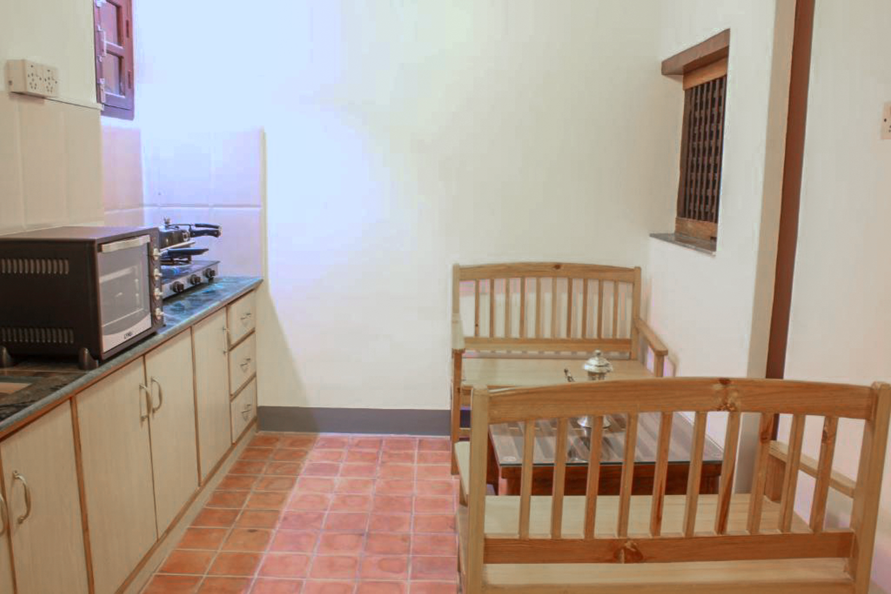 Mahalaxmi private kitchen and timber seating