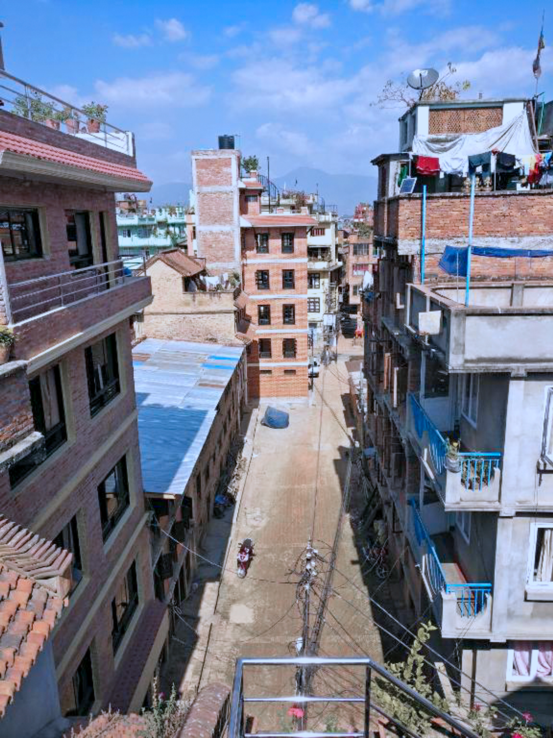 Patan courtyard and neighbouring buildings seen from the rooftop