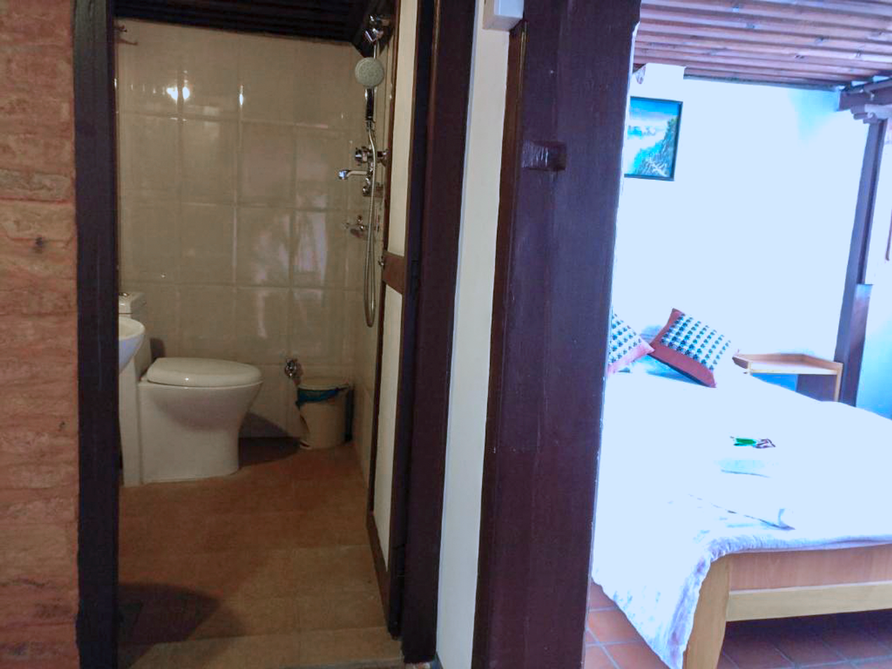 Indrayani private ensuite bathroom seen from the room doorway