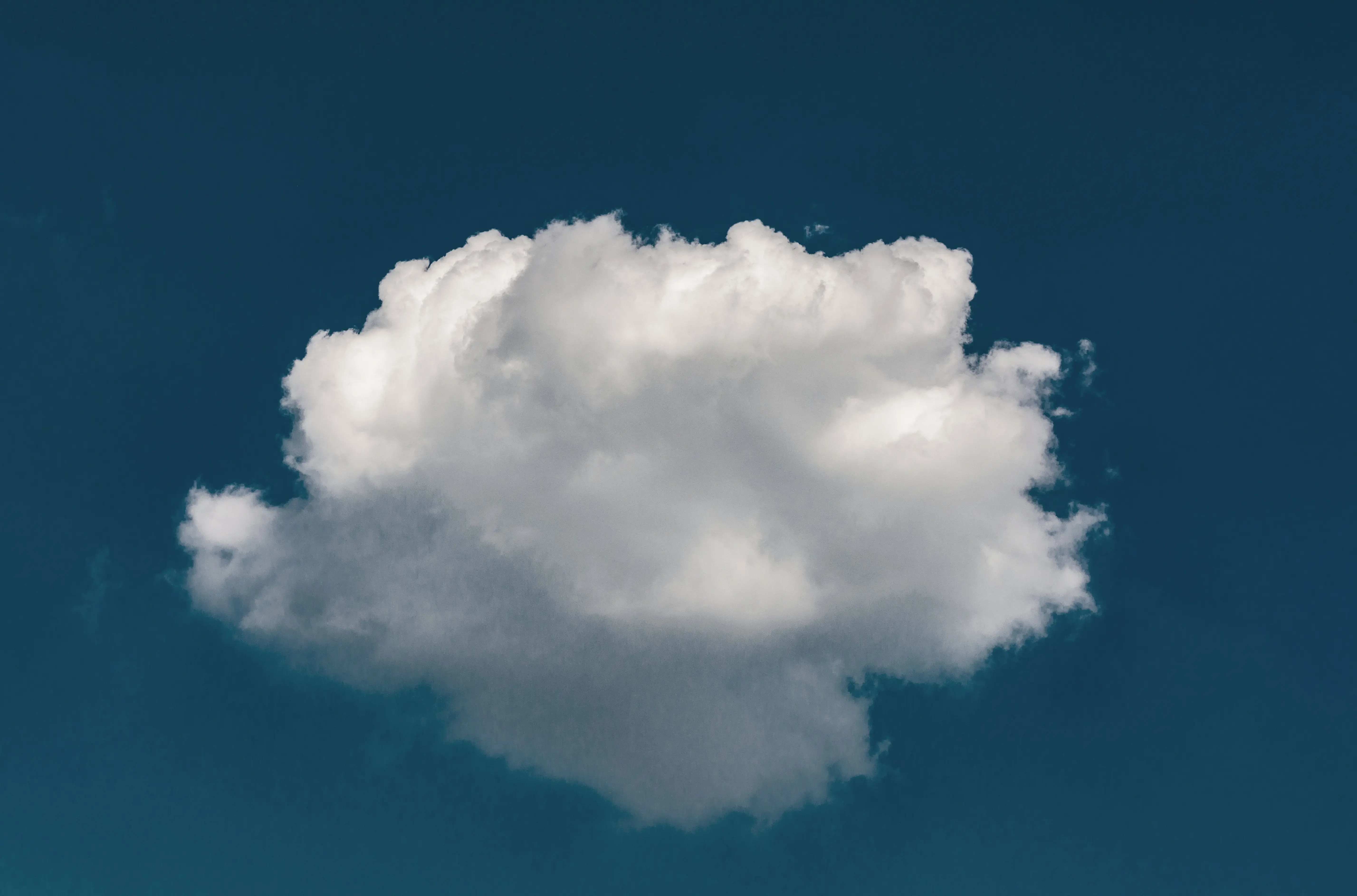 An image of a cloud on a blue sky. 