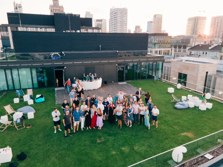 10C employees standing on a rooftop