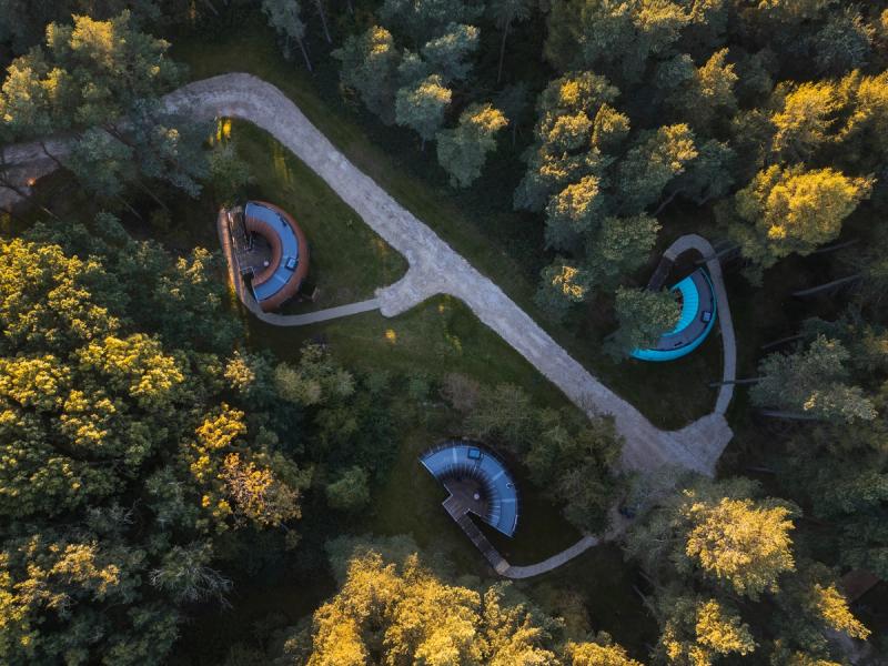 Multiple grid images of treedwellers treehouses surrounding by forest