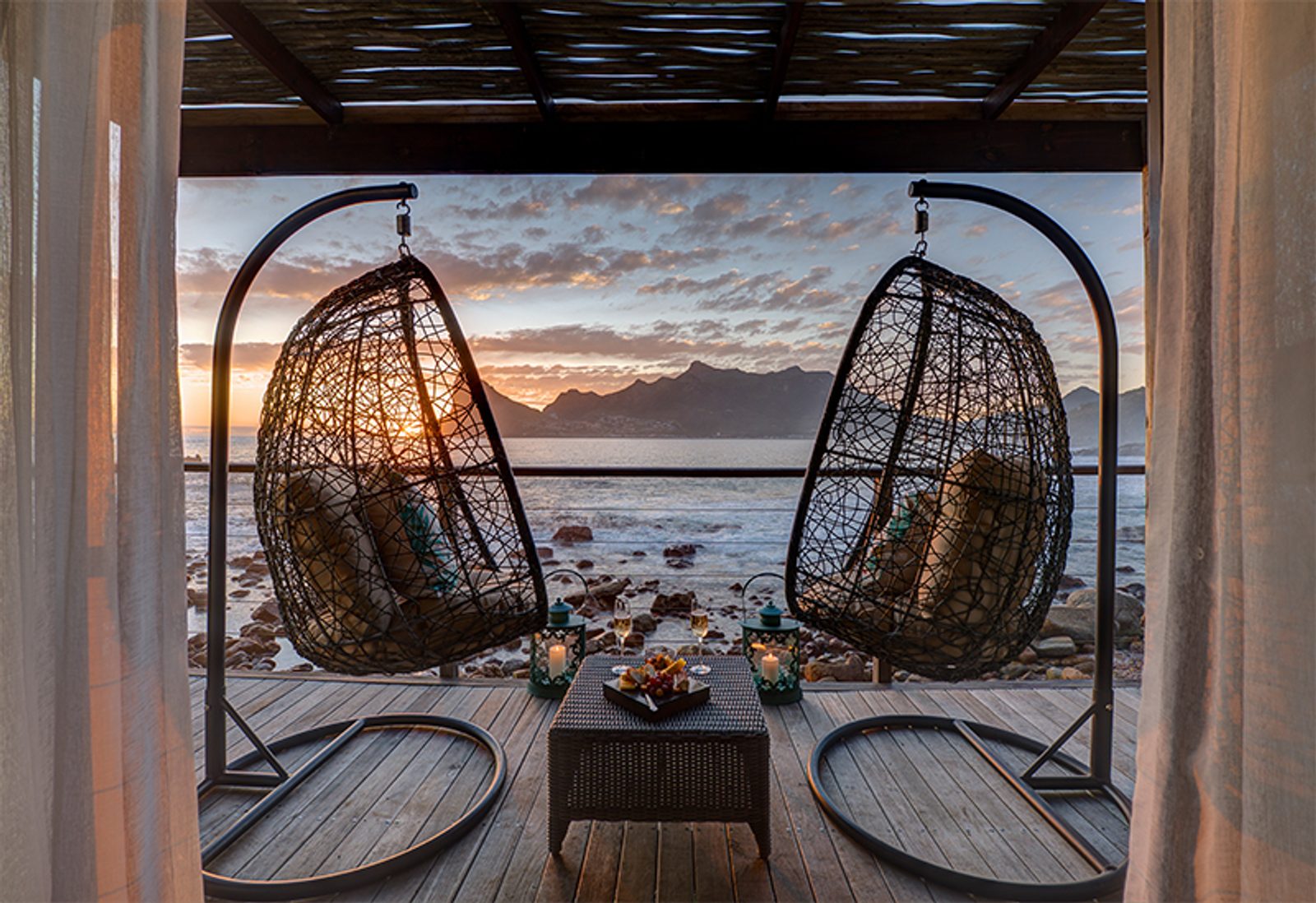ocean and mountain views from the deck of Tintswalo suite.