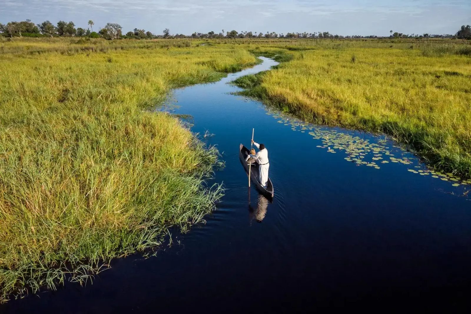 Time slows down on a mokoro through the waterways of Botswana’s Okavango Delta.