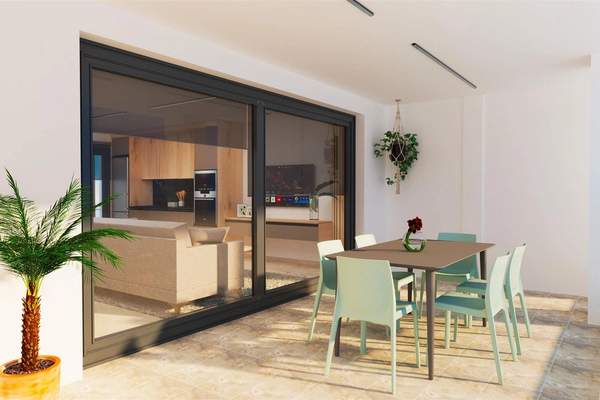 Representative daylight rendering of a covered terrace with dining table beside sliding glass doors