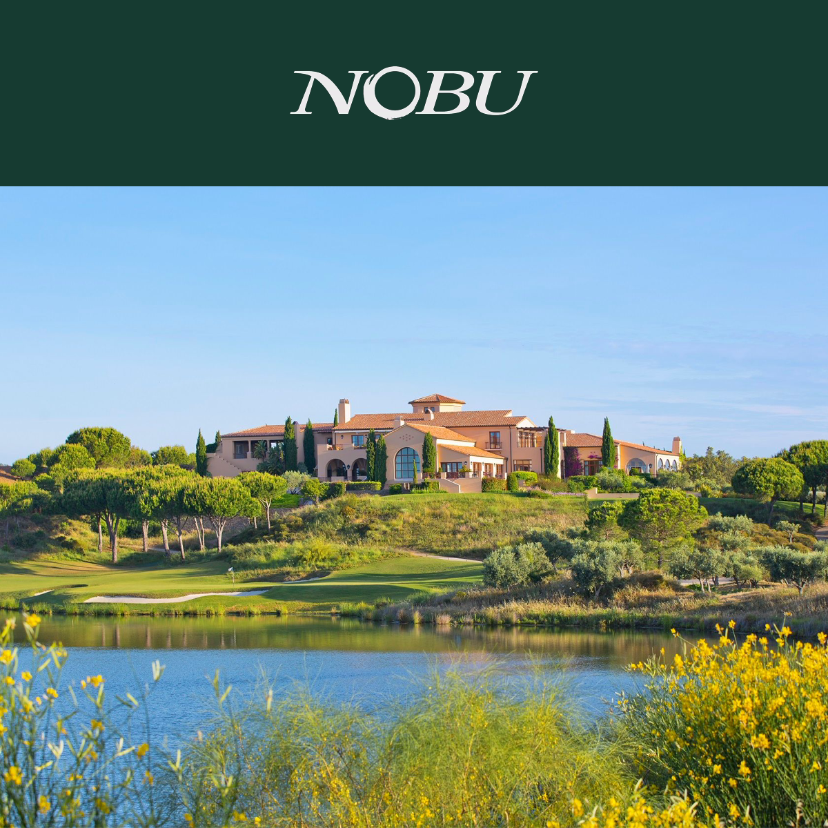 Nobu logo above Monte Rei Golf & Country Club in the eastern Algarve. The photograph shows the established resort, not a future Nobu-branded residence.