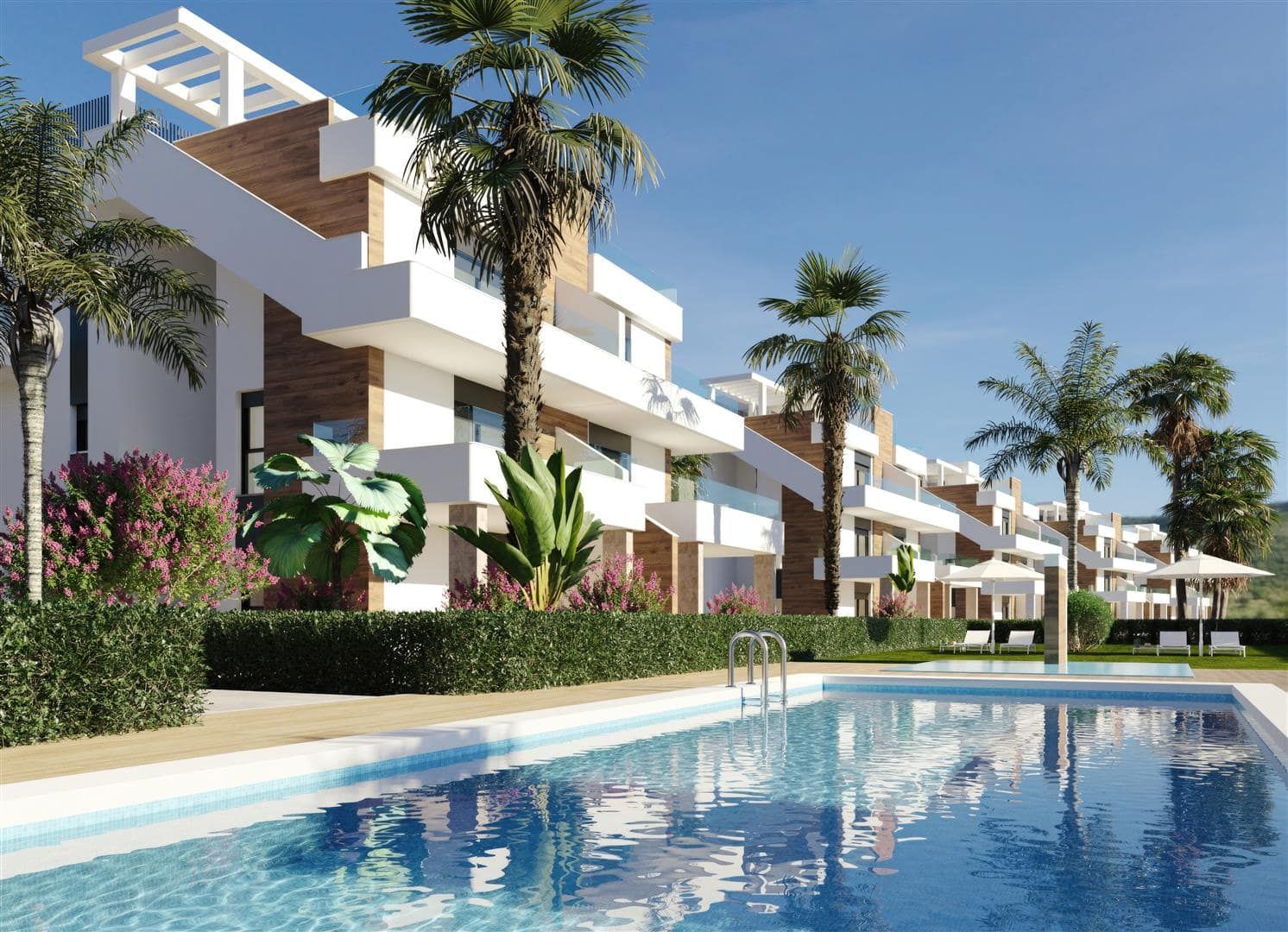Representative rendering of low-rise white apartments beside a communal swimming pool and landscaped gardens in daylight