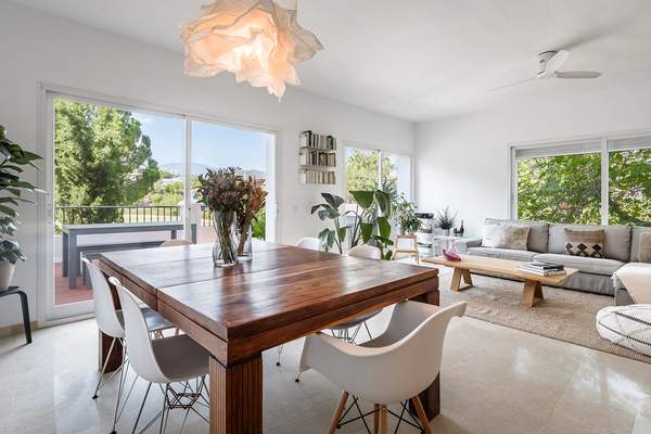 Dining and lounge area opening to terrace