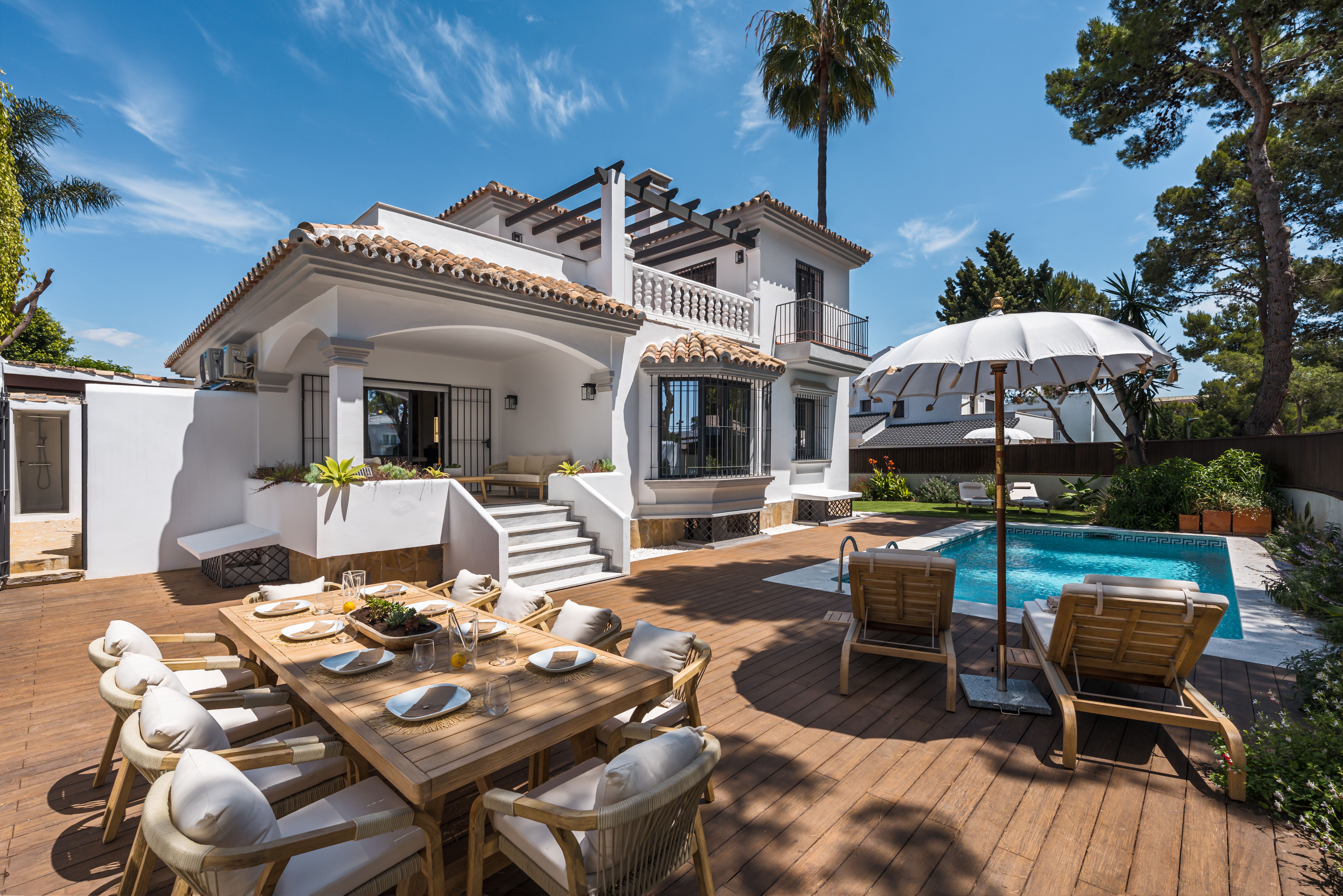 Daytime view of Casa Los Momentos with the private pool and outdoor dining terrace
